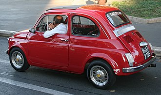 Fiat 500 in the Viale di Trastevere in Rome Italy.