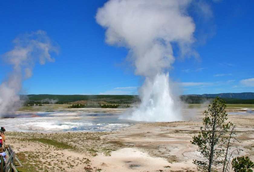 Old Faithful geyser erupting in Yellowstone National Park