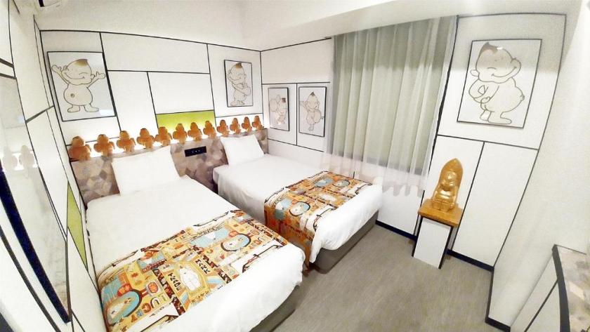 An anime-themed guest room at Henn na Hotel Osaka Shinsaibashi