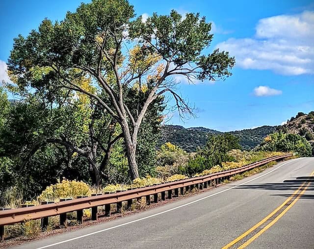 The road driving north from Santa Fe toward Taos